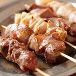 Assortment of five Grilled skewer