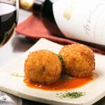 2 chicken rice Croquette with tomato sauce