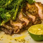 Herb marinated young chicken grilled with charred butter