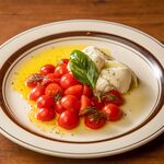 Caprese with lots of tomatoes and mozzarella