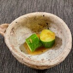 NOMI RESTAURANT - A cucumber that doesn't  realize it's being cu