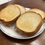 長濱浪漫ビール - アヒージョのバゲットと追加のバゲット　220円