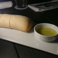 THE COSMOPOLITAN GRILL BAR TERRACE - パンは必ず出てきます(ｱｳﾄﾊﾞｯｸみたいw)