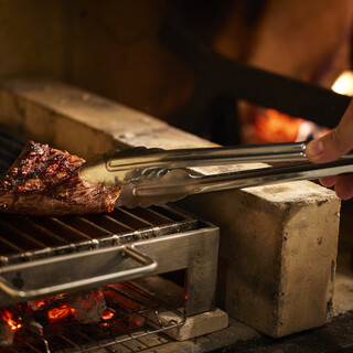 Choice of main dishes grilled over a wood fire