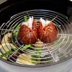 Restaurant Bellustar - 2023/9月下旬。伊勢海老をハーブ類で蒸し焼き。