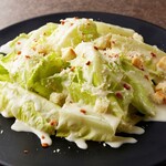 Caesar salad with lots of cheese