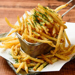 Adult fries green seaweed