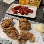 串焼亭ねぎ - 赤ウインナー 290円 自家製唐揚げ 420円