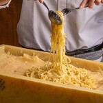 Fresh pasta with Parmesan cheese and black pepper