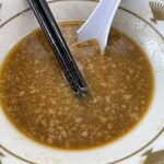 ラーメン もっけだの - 『青唐味噌つけ麺ニンニク野菜マシマシ+ネギ』のスープ