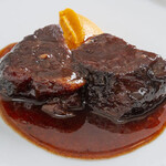 Stewed beef cheek in red wine with carrot and orange puree