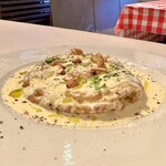 Round omelette with cheese and gorgonzola sauce