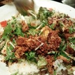 モンカジ - モンカジのタコライス（930円）豪快に混ぜてからいただきます。