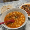 Shirukurodo Murato - 麺スープ税込950円。短く切った平麺と野菜の熱々トマトスープ。唐辛子の辛さが癖になる。
