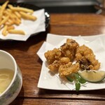 焼肉屋 幸三 - ポテトフライとタコ唐揚げ