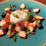 Directly from Italy: Burrata cheese, seasonal fruits, and fruit tomato caprese