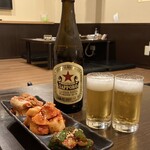 Marugyuu - キムチ三種盛り・サッポロラガー（中瓶）