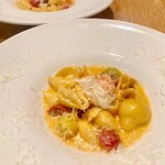 220416706 - カラフルトマトとズワイガニのクリームパスタ