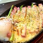 Oven grilled asparagus and bacon with cheese