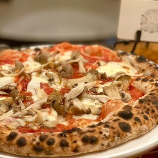 Neapolitan pizza baked in a stone oven imported from Italy at a reasonable price