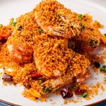 Stir-fried tiger prawns with bread crumbs and garlic butter