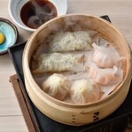 Three types of Dim sum sum steamed in a steamed basket