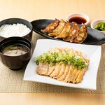 Set of tender chicken thighs with sesame ponzu sauce and fried Gyoza / Dumpling