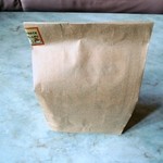 オーガニック洋菓子&ギフト こだわりぷりん エクリュ - 包装状態です。飾り気のない袋が渋い。