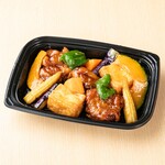 Chicken sweet and sour sauce with colorful vegetables and fried tofu