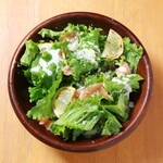 Caesar salad with grilled lemon and smoked salmon
