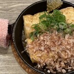 だれやめや - 揚げ豆腐のガーリックバター鉄板焼き