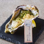 “Grilled” Oyster with basil and white sauce