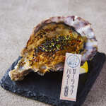 Grilled Oyster with garlic butter and herbs