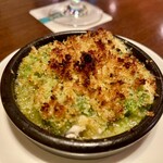 THE BAR - 北海道産鱈の白子の香草パン粉焼き。この下にたっぷりの白子が入っています。クリーミーでただも美味しい！白ワインと一緒に食べるともう最高。