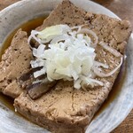 大衆酒場 馬越 - ▶︎肉豆腐 275円税込
            ガッツリと煮込まれた豆腐
            