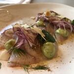 Trattoria Tabule - カンパチのカルパッチョ ハーブとアボカド、柑橘のビネグレット、これは日本人にしか作れない一品だと思う、正に和洋折衷、ワインにとても合う。