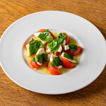 Caprese with fruit tomatoes and buffalo mozzarella cheese