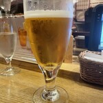 つるとんたん - 生ビール。飲みかけ…