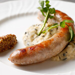 Grilled sausage with truffle potatoes