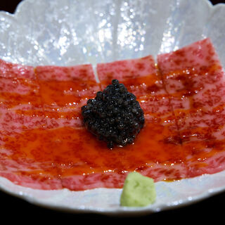 Our popular dish, Tajima beef sirloin yukke topped with caviar