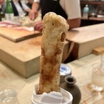 食堂 おがわ - “ウドの天麩羅”。アツアツ、ホクホク…。こんなデカいウド！粗塩のみをチョンチョンと付けて頂きます。