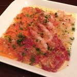 trattoria イタリアン SATOMI fooding - 海鮮カルパッチョ