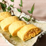 Fluffy dashi rolled egg Japanese style grated