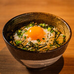 Egg-cooked rice with local chicken stock and soy sauce