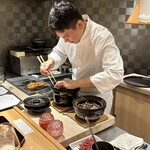 Nishi Azabu Manyou - 秋鮭の炊き込みご飯を作られてます