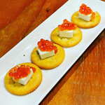 Salmon roe and cream cheese canapé