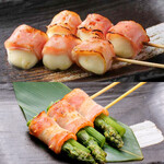 Tokachi caciocavallo bacon wrapped (2 pieces) / Asparagus bacon skewer (1 piece)