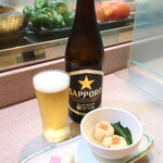 Rikuzen - 瓶ビール（サッポロ生ビール黒ラベル），お通し