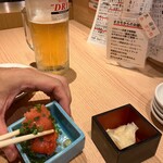 魚の店 オカモ倶楽部 - お通し　明太子はごま油をチョいたしてるみたいです。