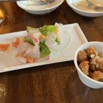 ピッツェリア クレス - カルパッチョ　右はオリーブの肉詰め